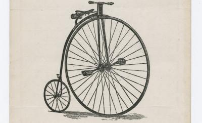 一辆前轮大后轮小得多的自行车放在页面中间的“自行车之歌”下面。